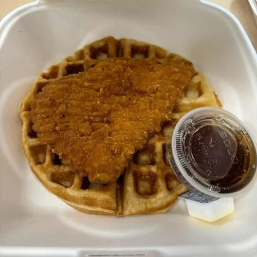 Chicken and Waffle - Crispy fried chicken served with a fluffy waffle and sweet maple syrup — a true crowd favorite.